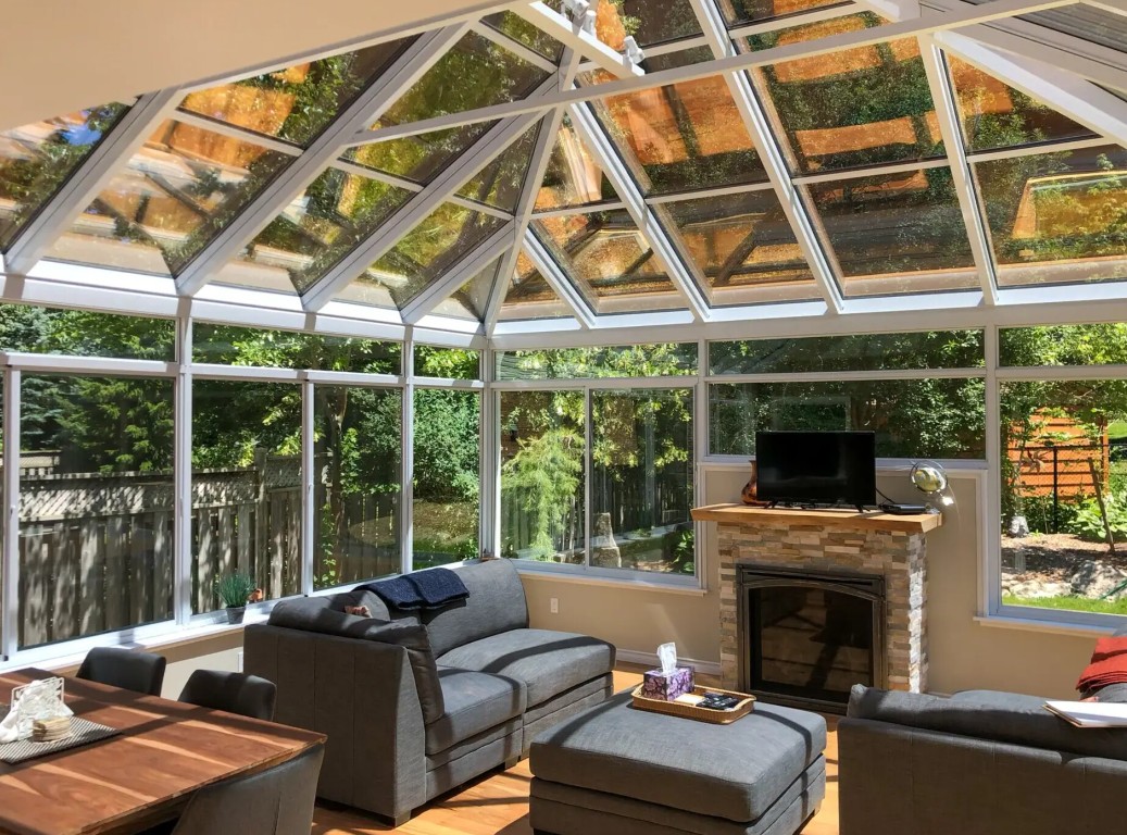 Four-season sunroom interior with glass roof and climate control in Gainesville, FL